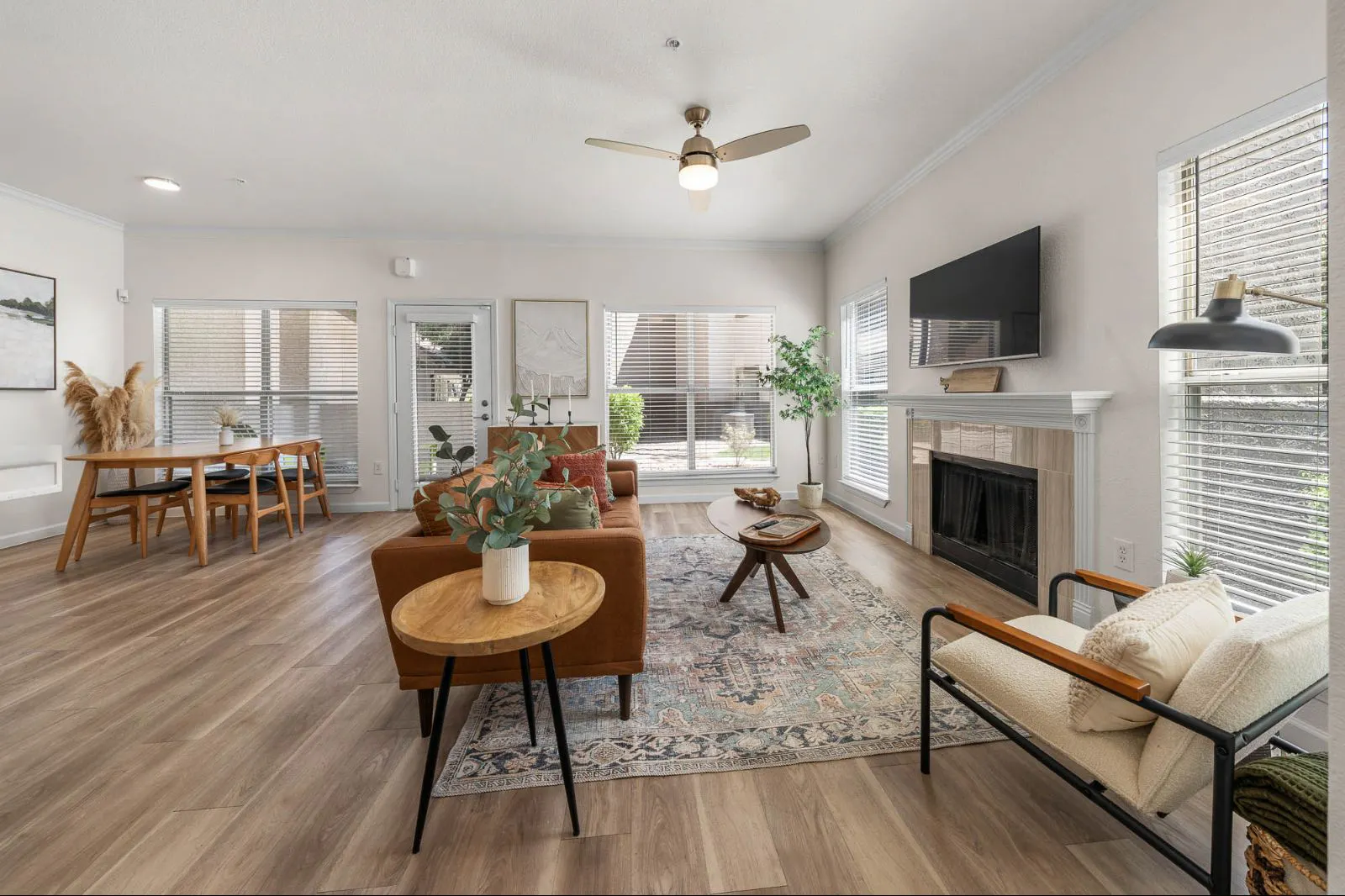 Furnished apartment living area shown — representative home at Arboretum at South Mountain.