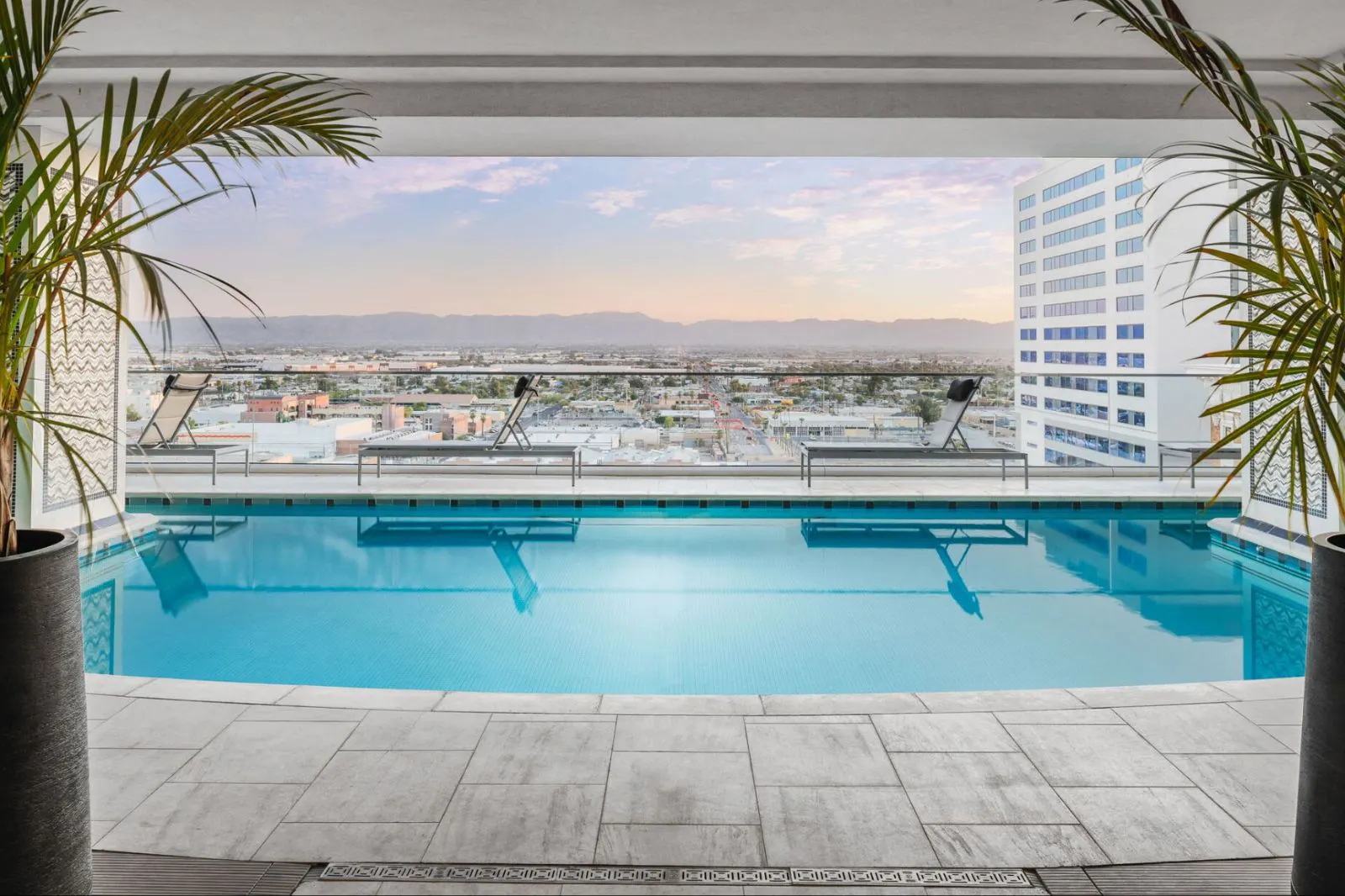 Pool and poolside area at CityScape Residences.