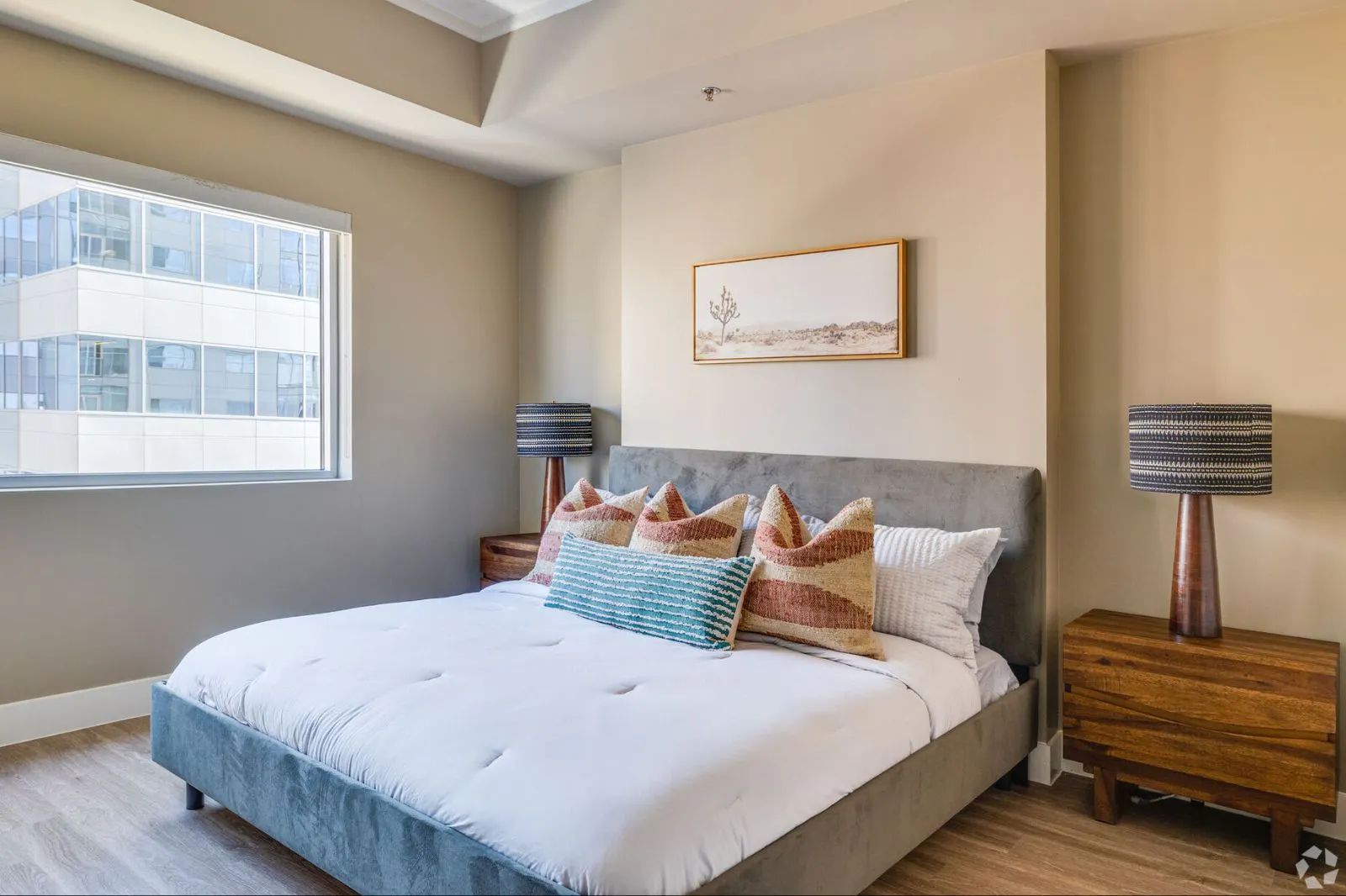 Furnished bedroom shown at CityScape Residences.