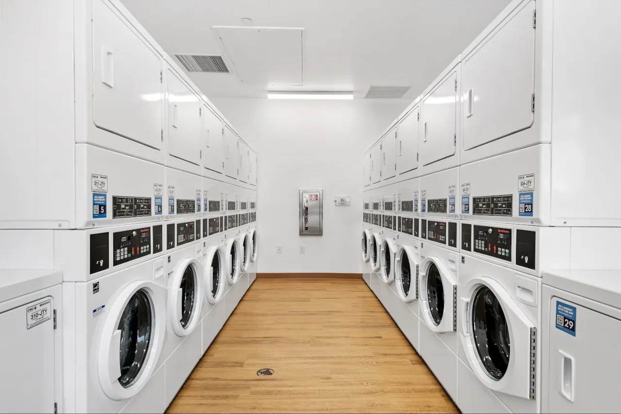 Shared laundry room at Residences at Falcon Park.