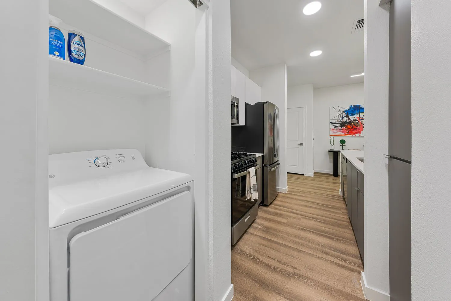In-home laundry area — representative home at The M at Shadow Mountain.